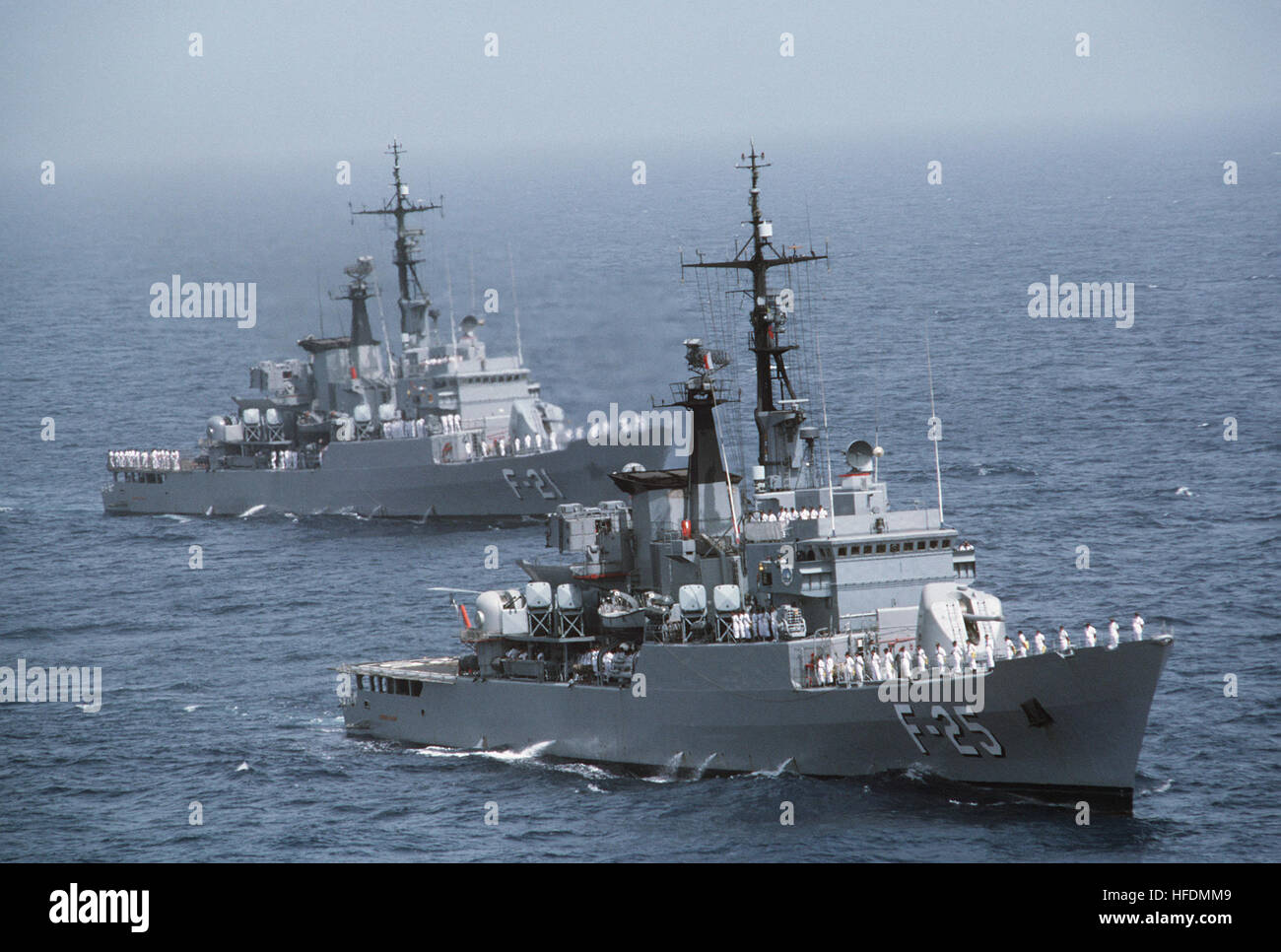 A starboard bow view of the Venzuelan frigates GENERAL SALOM (F 25) and the MARISCAL SUCRE (F 21) underway.  The ships are transporting Venezuelan officials. ARV General Sal%%%%%%%%C3%%%%%%%%B3m (F-25) y ARV Mariscal Sucre (F-21) - 1987-09855 Stock Photo