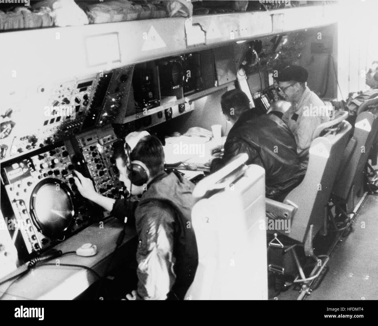 ASWsensor operators in Lockheed P3 Orion in August 1966 Stock Photo