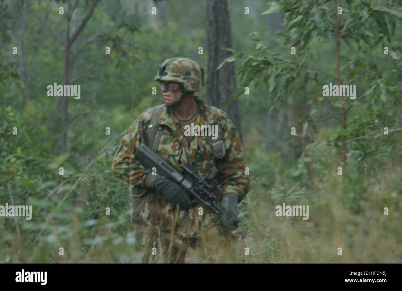 A soldier from the Third Royal Australian Regiment (3RAR) conducts ...