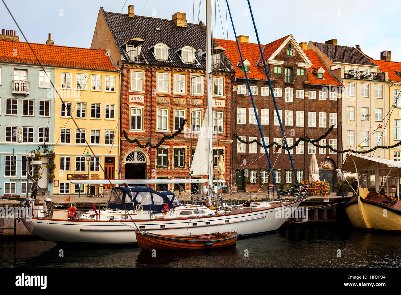 Ships and old buildings in the Nyhavn area of Copenhagen. Stock Photo