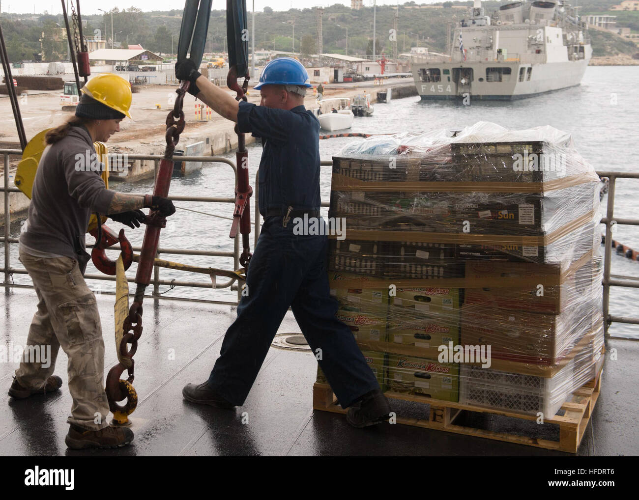 Boatswain Jim Conner, left, a civil service mariner aboard the joint