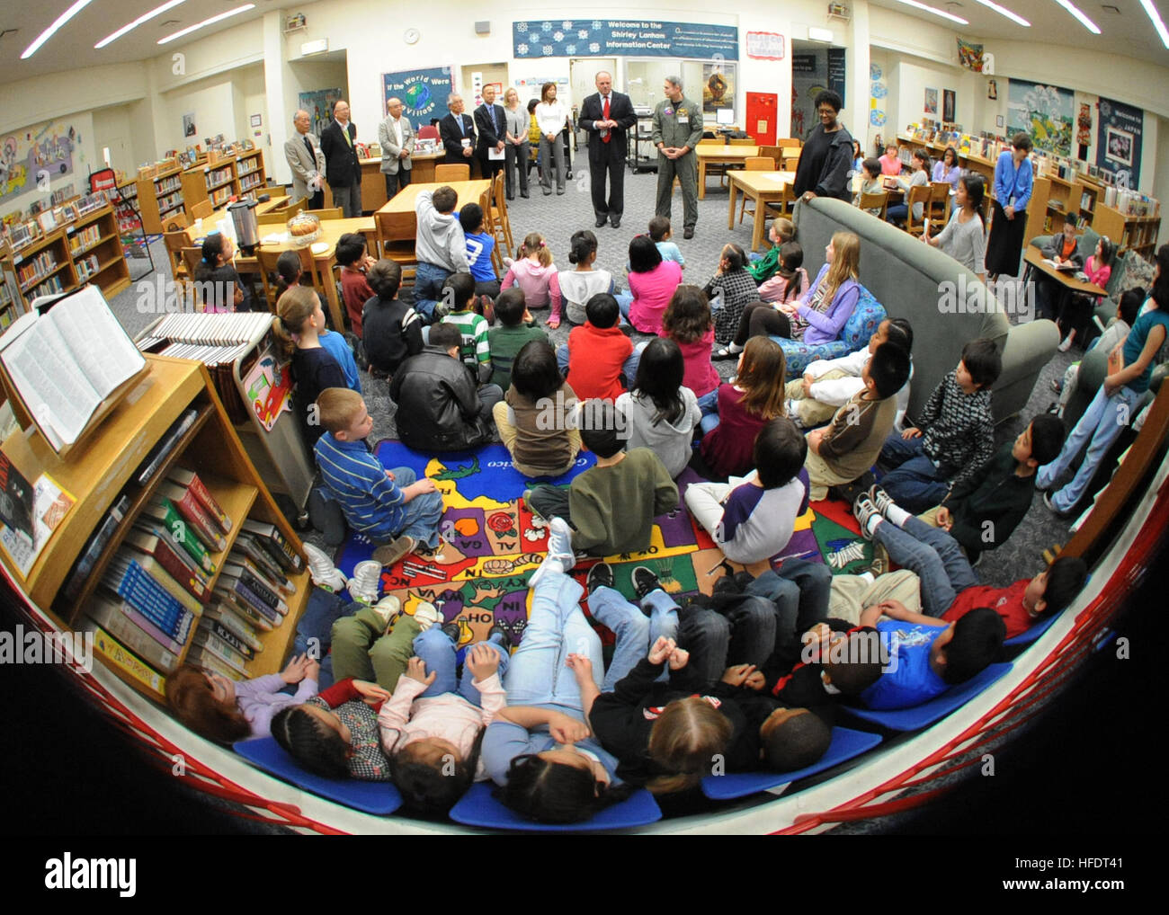 Capt. Eric Gardner, commanding officer of Naval Air Facility Atsugi, center right, joins Dave