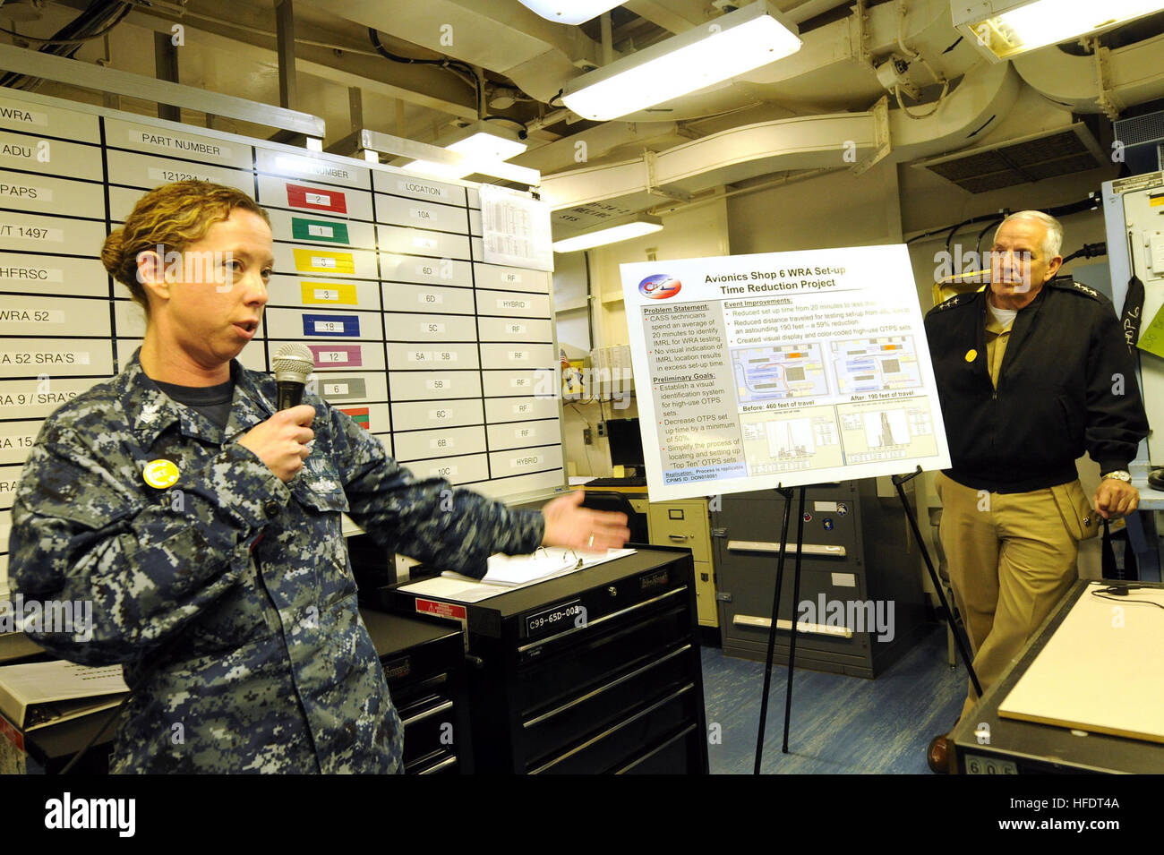 Aviation Electronics Mate 1st Class Christie Link gives a briefing to
