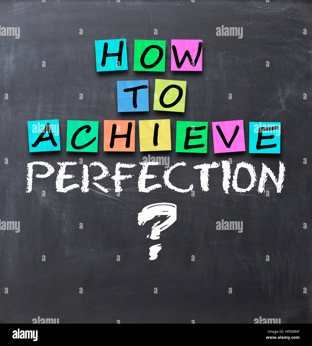 How to achieve perfection question on blackboard with adhesive notes Stock Photo