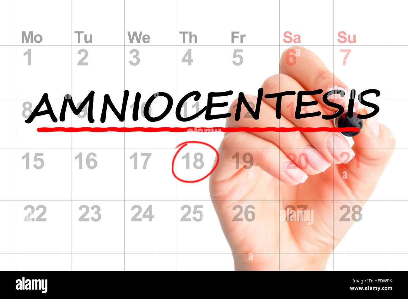 Amniocentesis schedule date on calendar Stock Photo