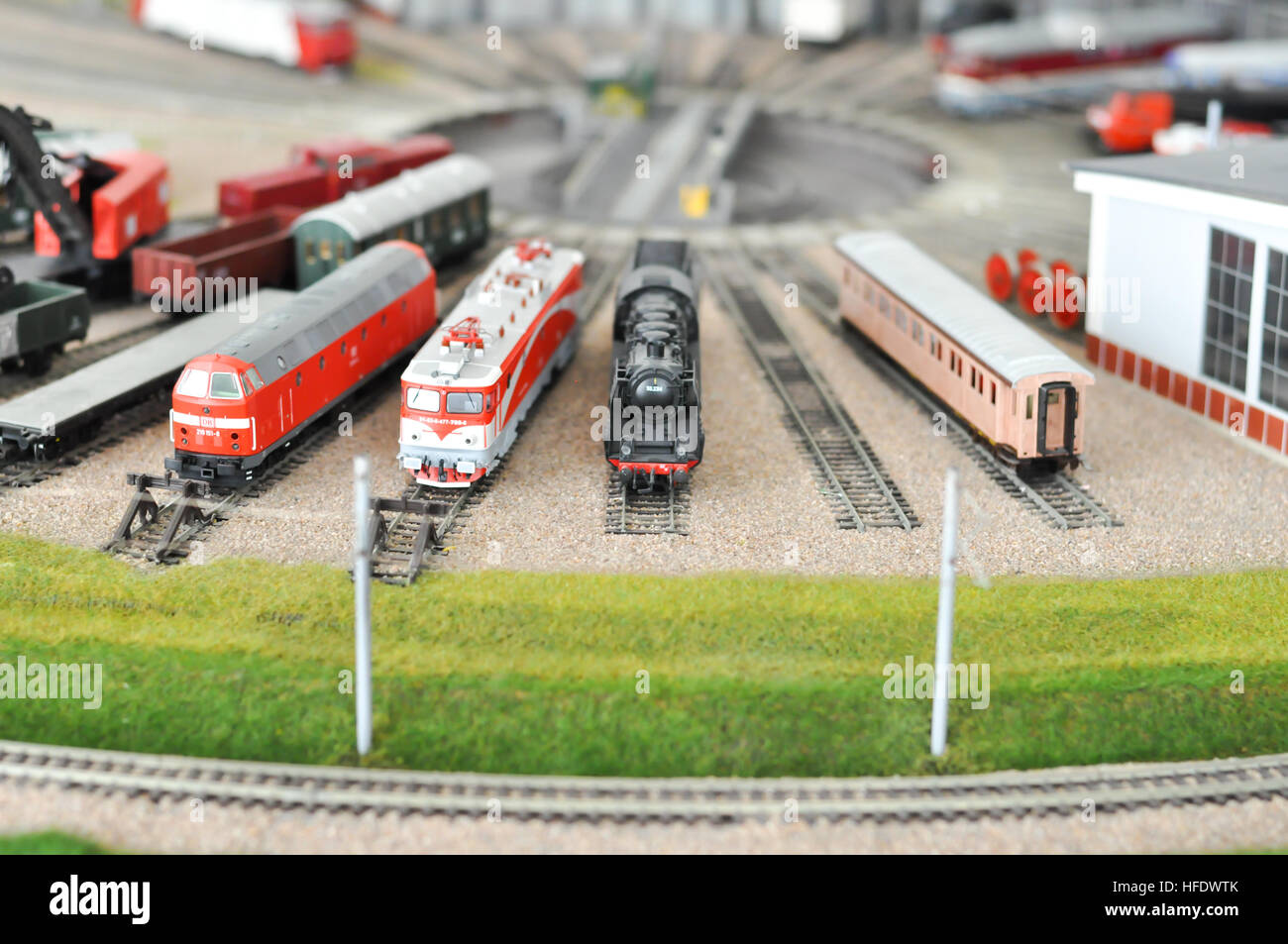 Railroad maquette with colorful trains Stock Photo - Alamy