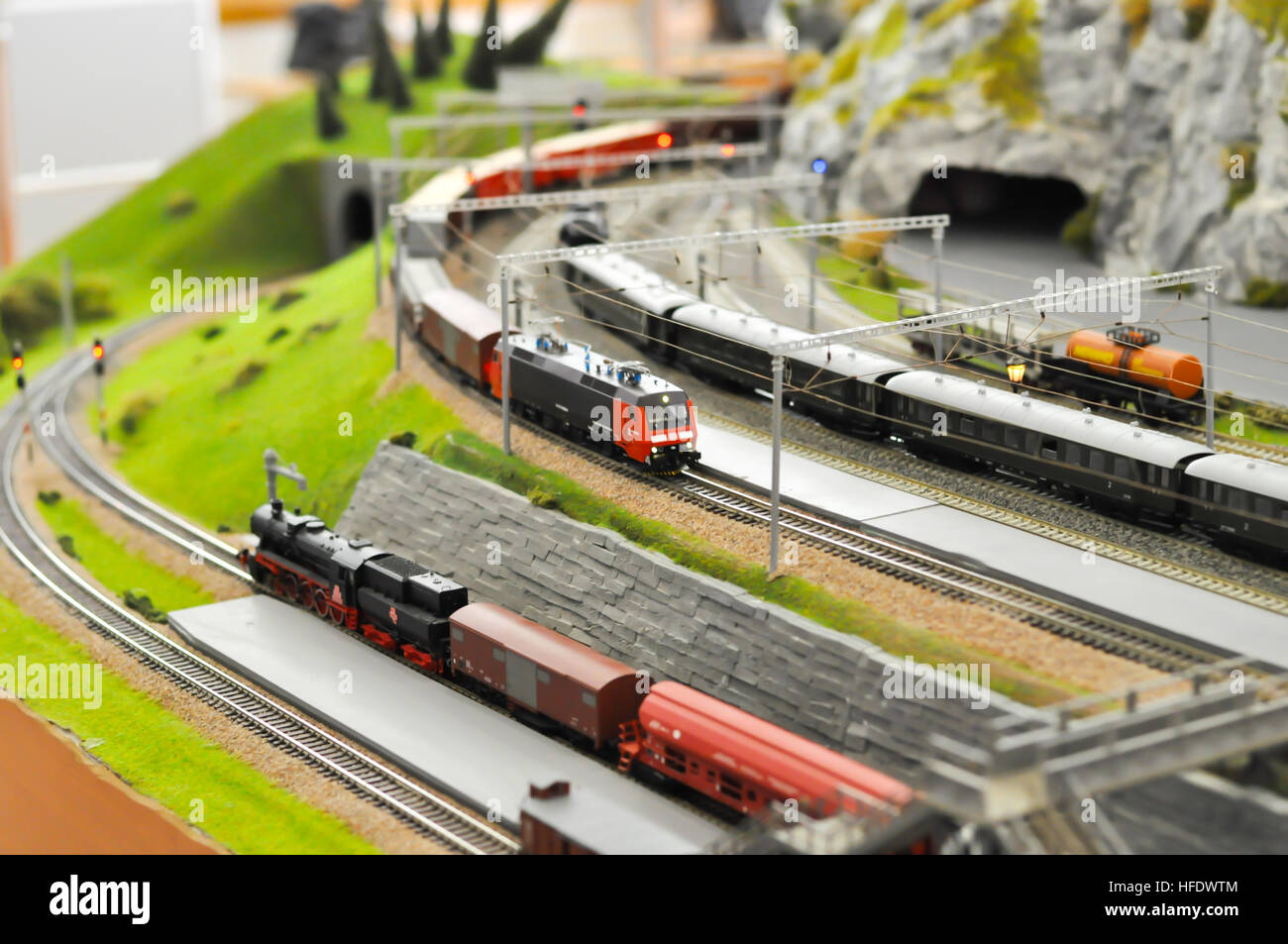 Railroad maquette with colorful trains Stock Photo - Alamy
