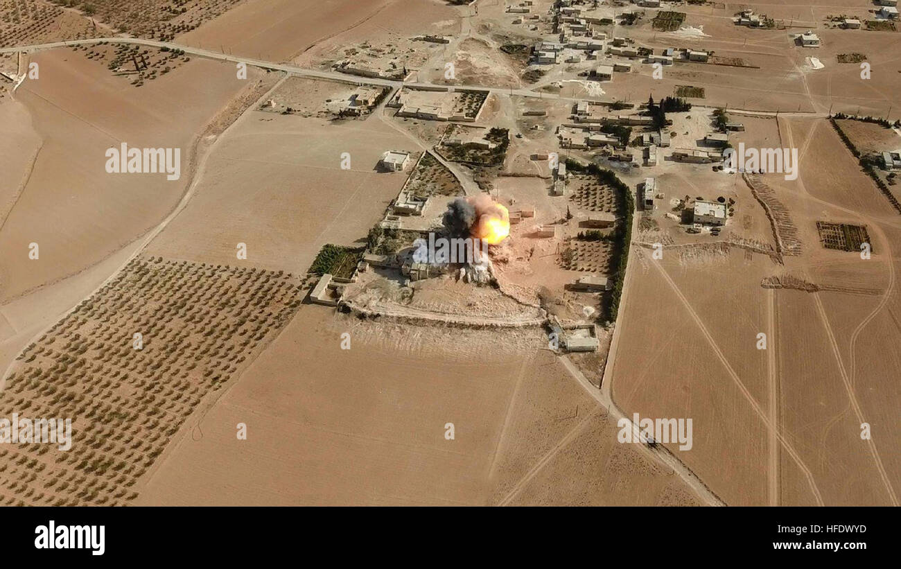 WARNING: GRAPHIC CONTENT: Still image taken from an ISIS propaganda video showing an aerial view shot by a consumer drone of a suicide bombing attack against Kurdish forces September 7, 2016 near Manbij, Aleppo province, Syria. Stock Photo