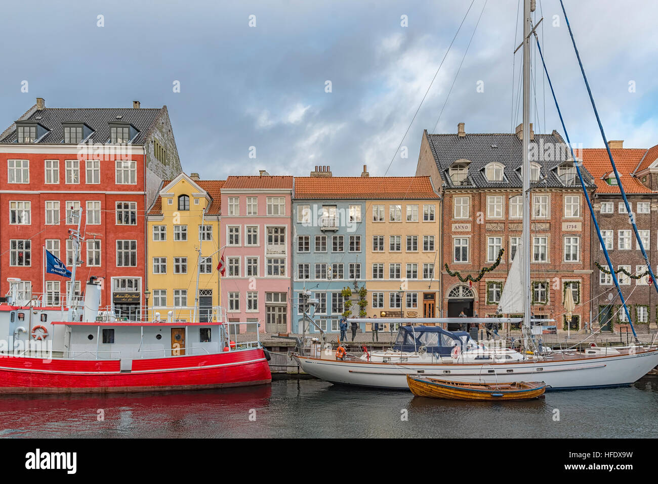 Nyhavn district is one of the most famous landmarks in Copenhagen, Denmark and always packed