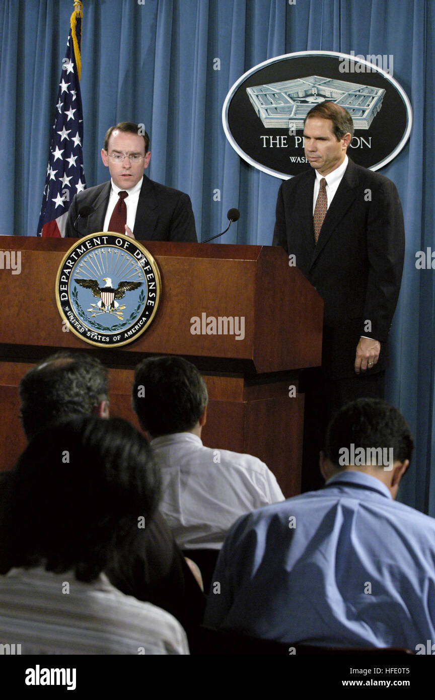 040614-D-2987S-060 Pentagon, Washington, D.C. (June 14, 2004) - Assistant Secretary of the Navy for Research Development and Acquisition John J. Young, Jr., left, announces a contract to the Boeing Company to develop the U.S. Navy's Multi-mission Maritime Aircraft (MMA). Built on a modified Boeing 737-800ERX, the 737-MMA will bring together a highly reliable airframe and high-bypass turbo fan jet engine with a fully connected, state-of-the-art open architecture mission system. This combination, coupled with next-generation sensors, will dramatically improve Anti-Submarine Warfare (ASW), and An Stock Photo