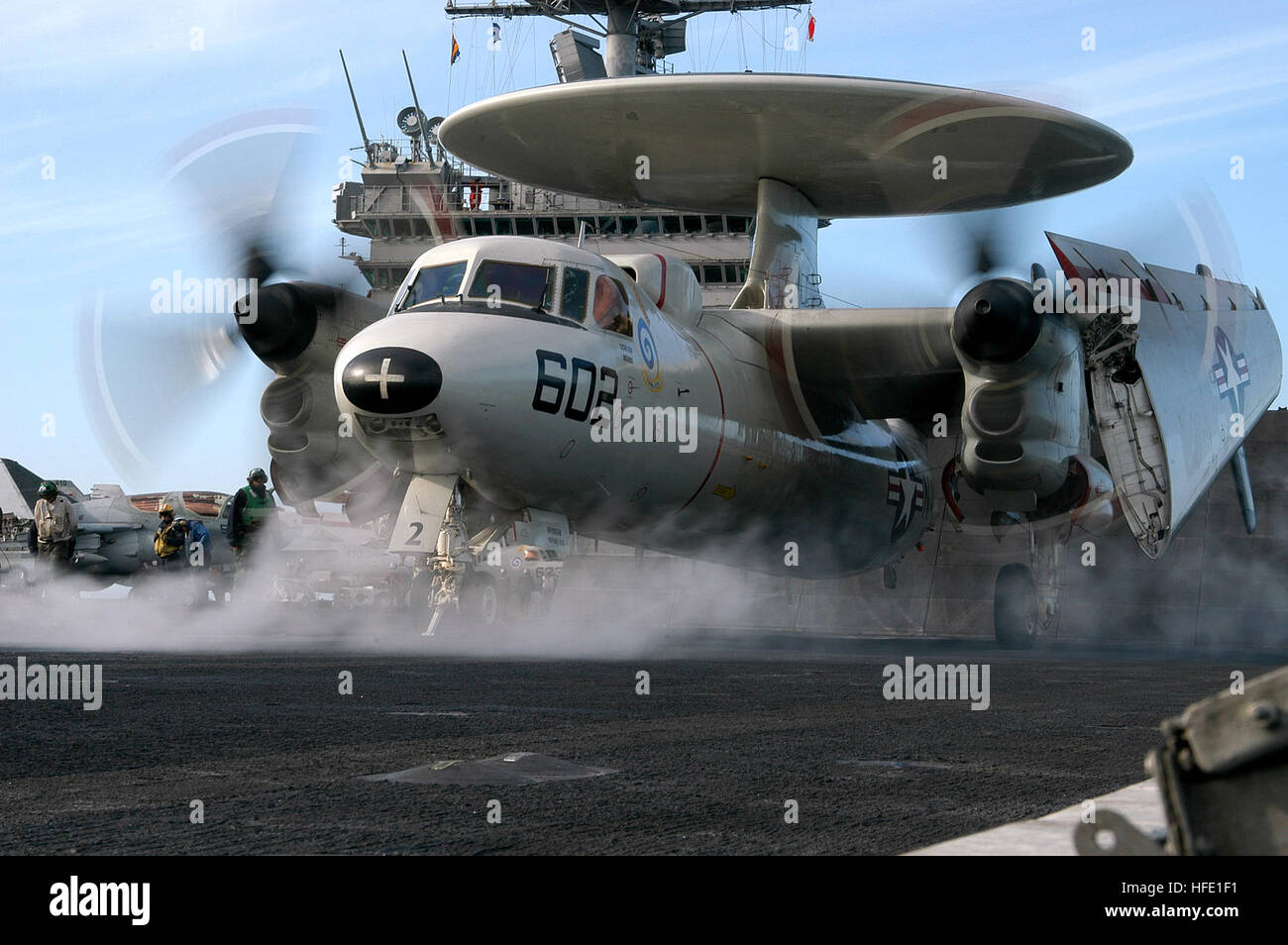 040628-N-0119G-013 Atlantic Ocean (June 28, 2004) - An E-2C Hawkeye assigned to the 'Screwtops' of Carrier Airborne Early Warning Squadron One Two Three (VAW-123) prepares to launch from one of four steam-powered catapults on the flight deck aboard USS Enterprise (CVN 65). Enterprise is one of seven aircraft carriers participating in Summer Pulse 2004. Summer Pulse 2004 is the simultaneous deployment of seven aircraft carrier strike groups (CSGs), demonstrating the ability of the Navy to provide credible combat power across the globe, in five theaters with other U.S., allied, and coalition mil Stock Photo