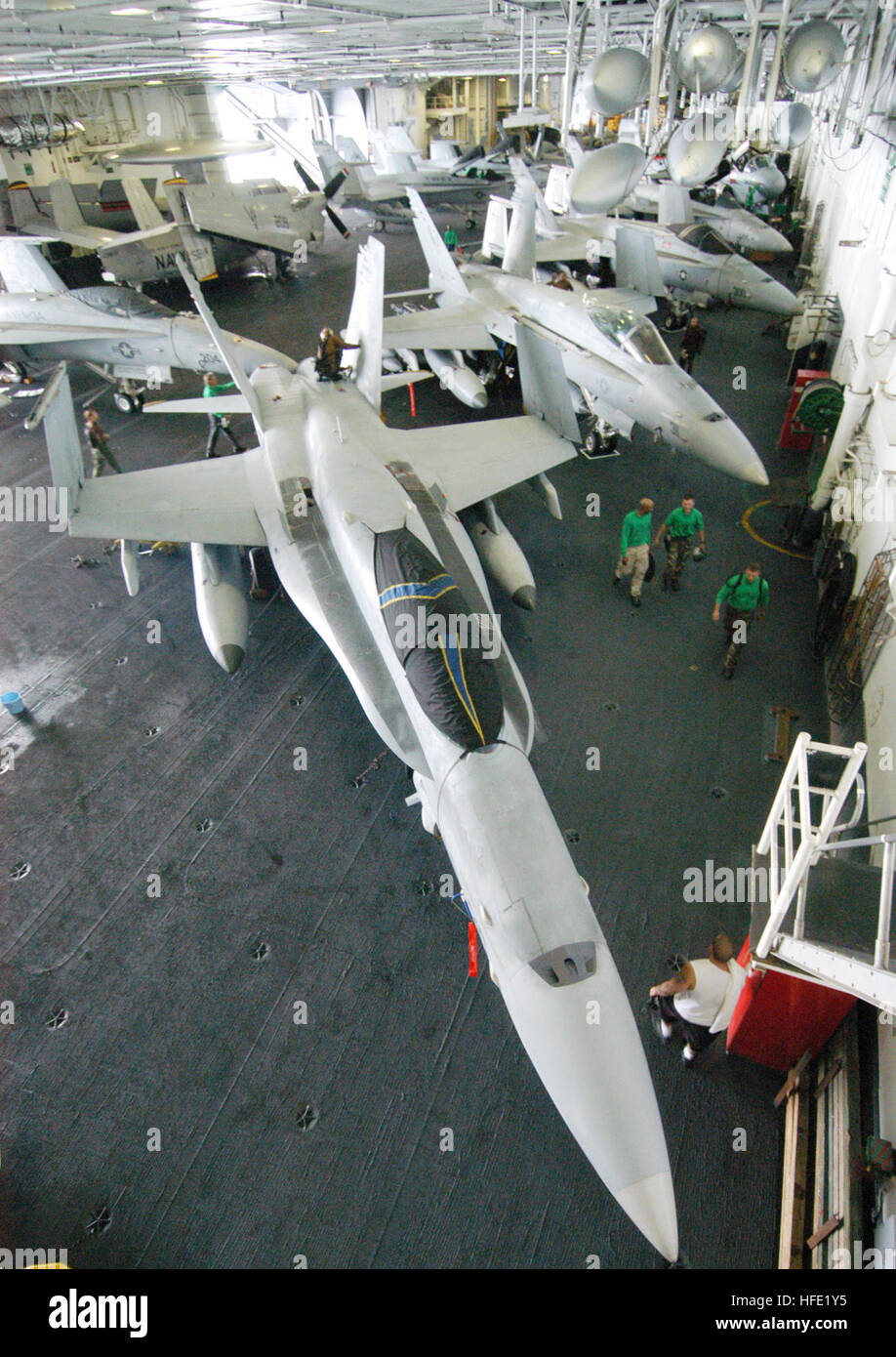 040609-N-7695R-002 Atlantic Ocean (June 9, 2004) Ð Aircraft assigned to Carrier Air Wing Seventeen (CVW-17) aboard USS John F. Kennedy (CV 67) fill the shipÕs hangar bay during operations supporting a Joint Task Force Exercise (JTFX) while training for an upcoming deployment. Kennedy is one of seven aircraft carriers involved in Summer Pulse 2004. Summer Pulse 2004 is the simultaneous deployment of seven aircraft carrier strike groups (CSGs), demonstrating the ability of the Navy to provide credible combat power across the globe, in five theaters with other U.S., allied, and coalition military Stock Photo