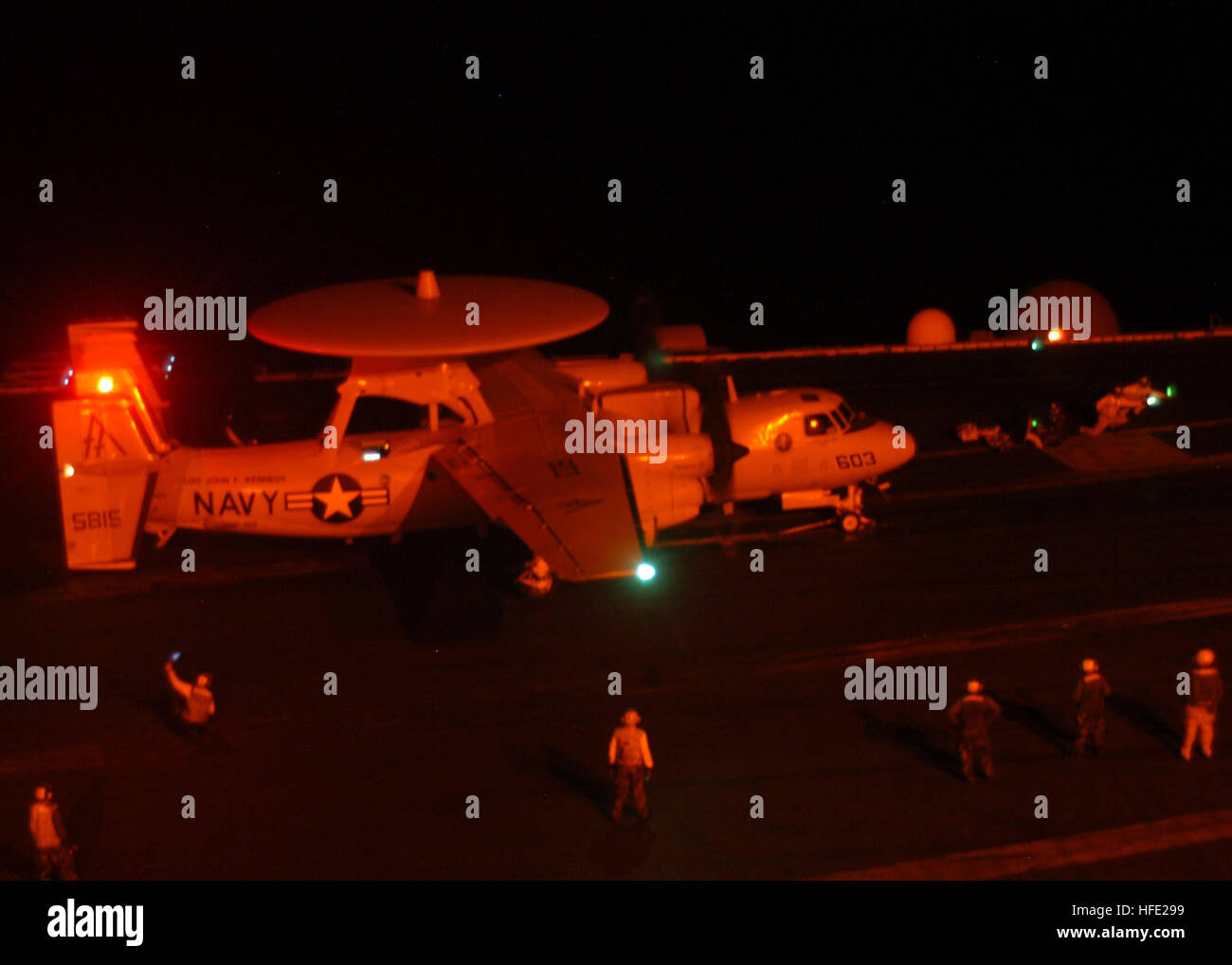 040715-N-4549D-001 Arabian Gulf (July 15, 2004) Ð An E2-C Hawkeye from Airborne Early Warning Squadron One Two Five completes final checks prior to launching aboard USS John F Kennedy (CV67). The Kennedy and embarked Carrier Air Wing Seventeen (CVW-17) are taking part in missions supporting Operation Iraqi Freedom during her deployment supporting the Navy's new Fleet Response Plan (FRP) Summer Pulse 2004. Summer Pulse 2004 is the simultaneous deployment of seven carrier strike groups (CSGs), demonstrating the ability of the Navy to provide credible combat across the globe, in five theaters wit Stock Photo