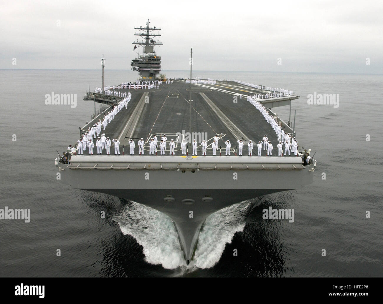 040723-N-7615S-110  Pacific Ocean (Jul. 23, 2004) - The NavyÕs newest and most technologically advanced aircraft carrier USS Ronald Reagan (CVN 76), prepares to enter San Diego harbor for a homeporting celebration, welcoming the ship to San Diego, Calif., and officially joining the U.S. Pacific Fleet. The celebration will include various dignitaries, including former First Lady Nancy Reagan, members of the Congress, state officials and celebrities. Commanded by Capt. James A. Symonds, the ship was commissioned in July 2003, and is completing a two-month transit around South America to her new  Stock Photo