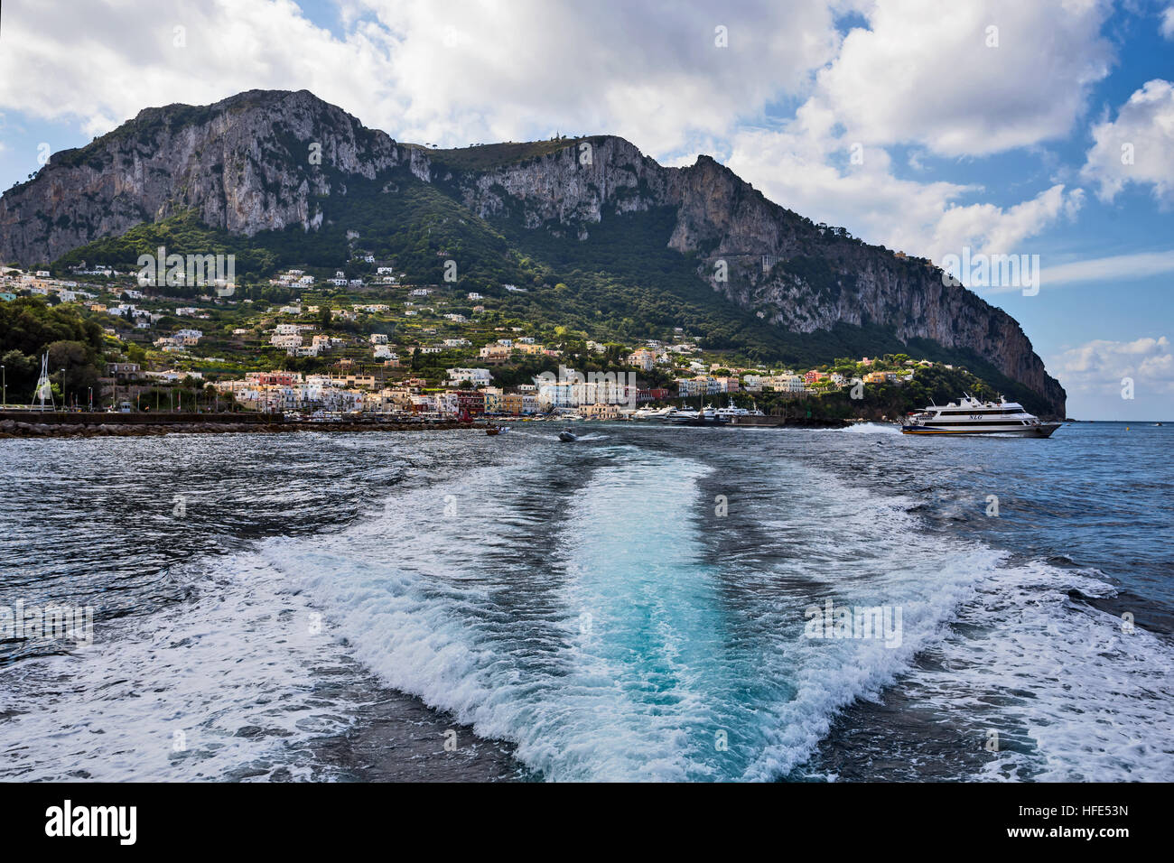 Capri from tourist boat,, an island, Bay of Naples, Italy, Europe Stock Photo