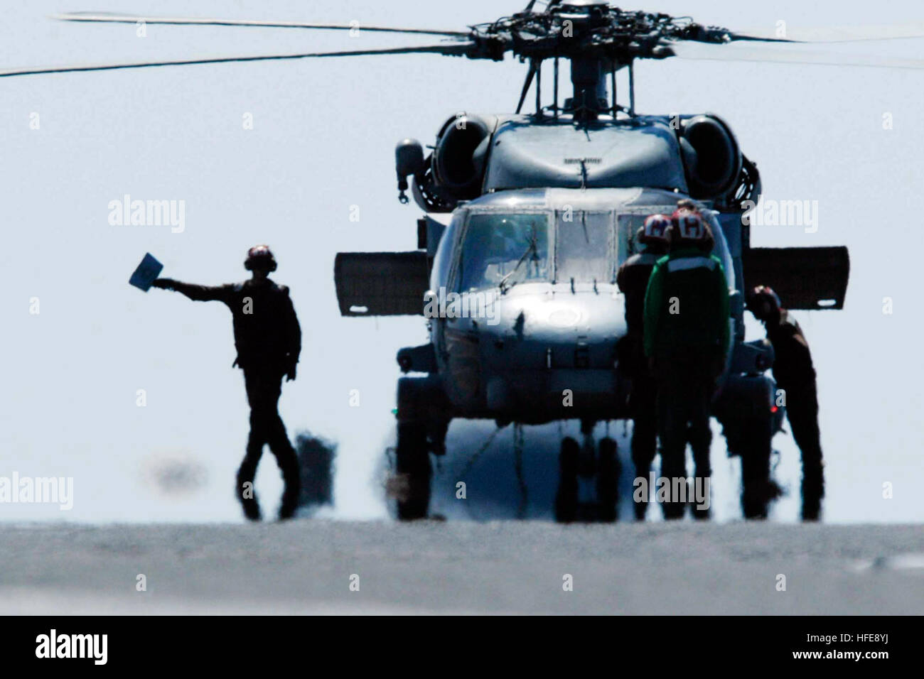 050125-N-1229B-012 Indian Ocean (Jan. 25, 2004) - Helicopters aboard USS Abraham Lincoln (CVN 72) prepare to lift off the deck in support operations for the relief efforts in Indonesia. The Lincoln Carrier Strike Group (CSG) is supporting Operation Unified Assistance, the humanitarian operation effort in the wake of the Tsunami that struck South East Asia. The Lincoln CSG is currently operating in the Indian Ocean off the waters of Indonesia and Thailand. U.S. Navy photo by Photographer's Mate Airman Patrick M. Bonafede (RELEASED) US Navy 050125-N-1229B-012 Helicopters aboard USS Abraham Linco Stock Photo