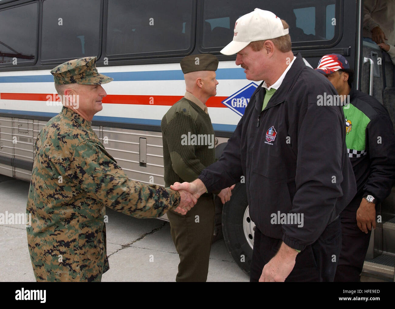 050204-N-0874H-006 Blount Island, Jacksonville, Fla. (Feb. 4, 2005) - Commanding Officer, Blount Island Command, Col. Carl D. Matter, left, greets National Football League (NFL) Hall of Famer, Ted Hendricks, on board Blount Island, Fla. Hendricks played for the Baltimore Colts (1969-1973), Green Bay Packers (1973) and Oakland Raiders (1975-1983). Twenty-two NFL Hall of Fame players visited the Marines and Sailors assigned to Blount Island Command to show their support for the local Sailors and Marines as part of Super Bowl XXXIX kick-off festivities. U.S. Navy photo by Photographer's Mate 2nd  Stock Photo