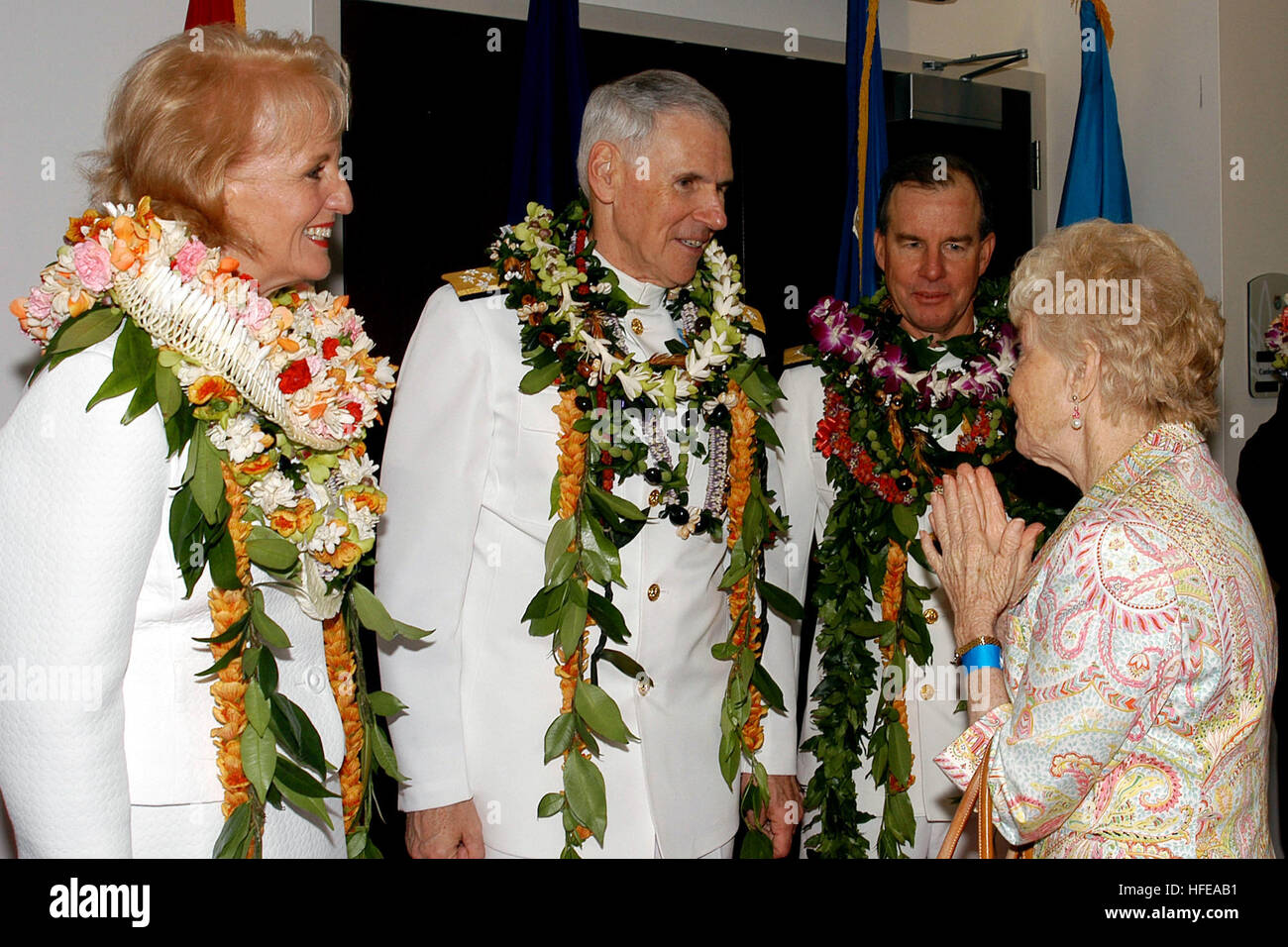 050226-N-5640H-119 Camp Smith, Hawaii (Feb. 26, 2005) Ð Adm. William J. Fallon, center, Mrs. Fallon, left, and Adm. Thomas B. Fargo greet guest at the reception which immediately followed the U.S. Pacific Command (PACOM) change of command on board Camp Smith, Hawaii. Fallon relieved Fargo to become the 21st Commander, U.S. Pacific Command. U.S. PACOM's area of responsibility spans from the west coast of the United States to the east coast of Africa. PACOM was established Jan. 1, 1947 and located in the Makalapa Compound on the island of Hawaii, and moved to Camp Smith October of 1957. U.S. Nav Stock Photo