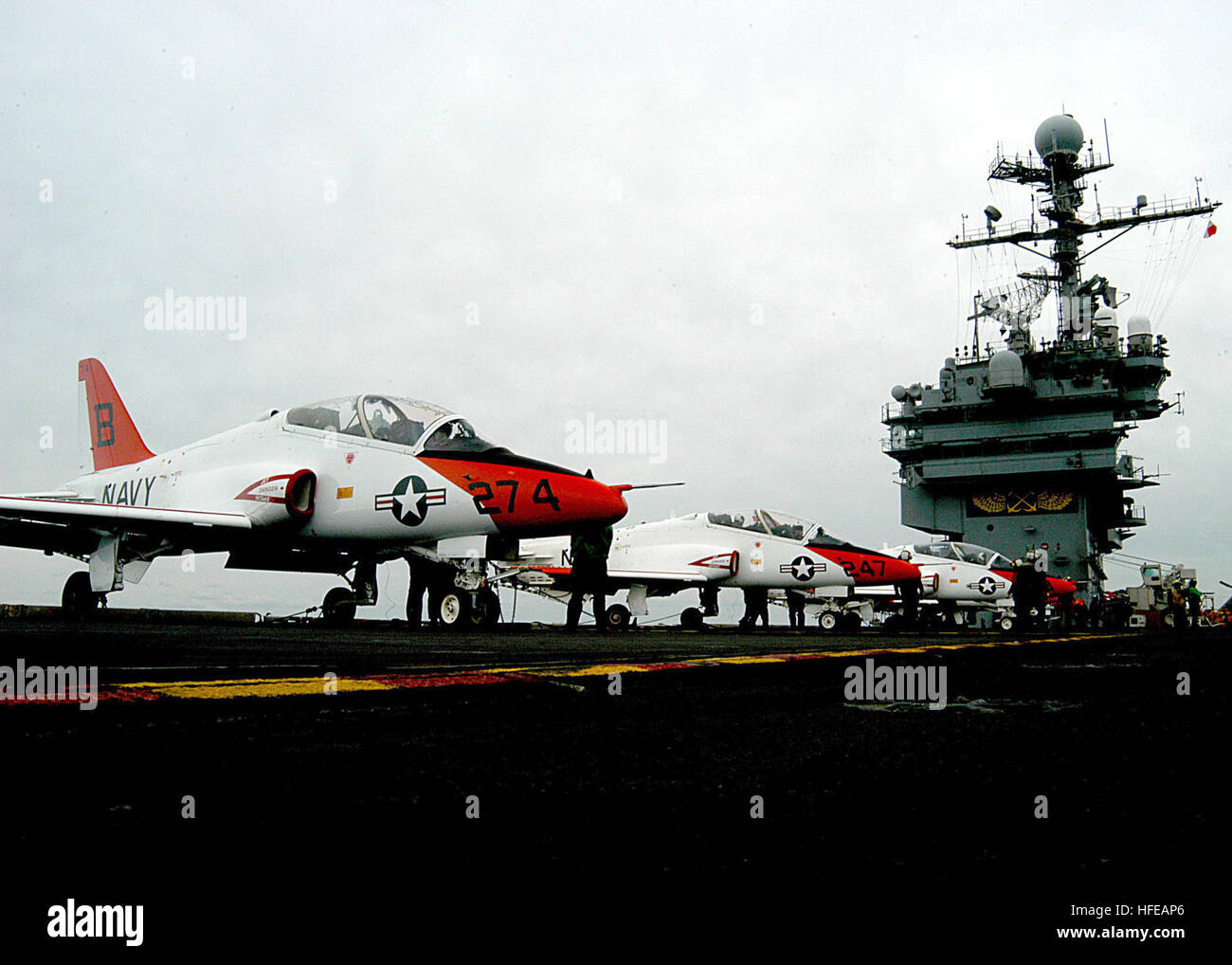 050309-N-4565G-002 Atlantic Ocean (Mar. 9, 2005) - Squadron personal assigned to the “Golden Eagles” of Fixed Wing Training Squadron Two Two (VT-22), begin pre-flight checks on their T-45A Goshawks prior to carrier qualification operations aboard the conventionally powered aircraft carrier USS John F. Kennedy (CV 67). The T-45A Goshawk is a carrier-capable trainer aircraft used by both the Navy and Marine Corps for pilot training. The Mayport, Fla., based aircraft carrier is conducting scheduled carrier qualifications in the Atlantic Ocean. U.S. Navy photo by Photographer’s Mate 3rd Class Tomm Stock Photo