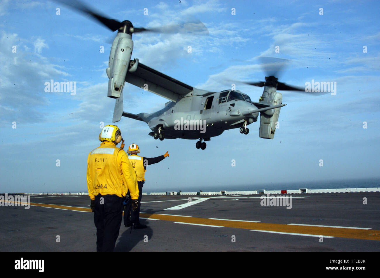 050323-N-7945K-204 Atlantic Ocean (Mar. 23, 2005) - An MV-22 Osprey, assigned to the “Argonauts” of Marine Tiltrotor Operational Test and Evaluation Squadron Two Two (VMX-22), takes off from the flight deck aboard the amphibious assault ship USS Nassau (LHA 4). Nassau personnel are working with the Osprey tiltroters for the first time during a weeklong underway period. The Air Department aboard Nassau spent a month preparing for the evolution by sending personnel to Chambers Field, Norfolk, Va., to view the MV-22 Osprey during flight operations. U.S. Navy photo by Photographer's Mate 3rd Class Stock Photo