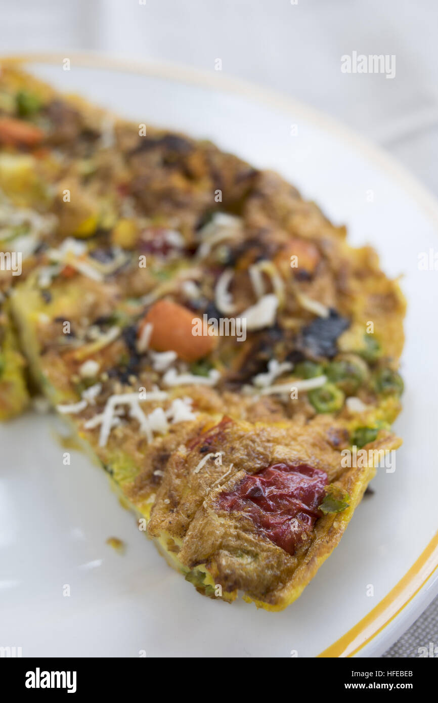 omelette with variety of vegetables and parmesan Stock Photo