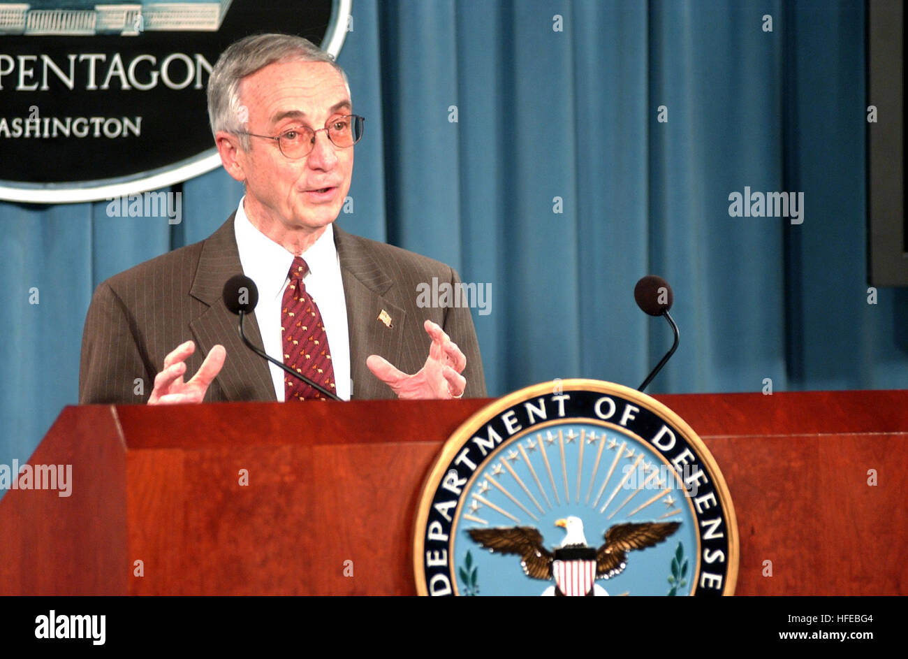 050329-N-2568S-001 Pentagon, Washington, D.C. (March 29, 2005) - Secretary of the Navy Gordon England answers questions at a news conference after he announced the completion of the Combatant Status Review Tribunal (CSRT) process in the Pentagon press briefing room. The CSRT process is designed to assess whether each detainee held by the Department of Defense at Guantanamo Bay Naval Base, Cuba, should continue to be classified as an enemy combatant. U.S. Navy photo by Chief Journalist Craig P. Strawser (RELEASED) US Navy 050329-N-2568S-001 Secretary of the Navy Gordon England answers questions Stock Photo