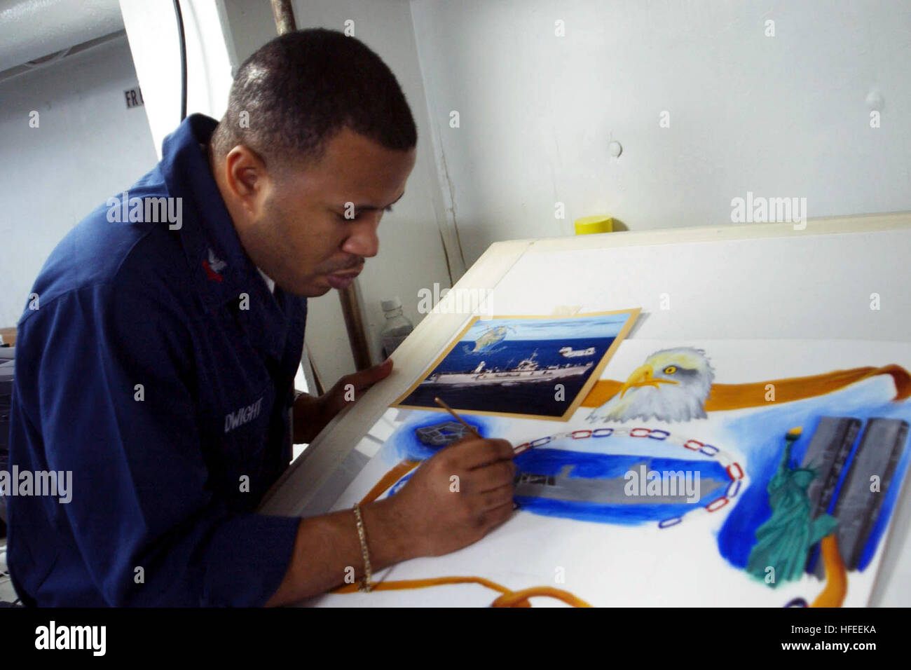 021231-N-9867P-021 Aboard USS Mount Whitney (LCC/JCC 20) Dec. 31, 2002 -- Draftsman 2nd Class Ernie Dwight works on an assignment in the shipÕs photo lab.  The Mount Whitney and her embarked Marine detachment are deployed to the Horn of Africa region to participate in Operation Enduring Freedom and the continuing war on terrorism.  U.S. Navy photo by PhotographerÕs Mate 3rd Class Scott Phillips.  (RELEASED) US Navy 021231-N-9867P-021 Draftsman 2nd Class Ernie Dwight works on an assignment in the ship%%5Ersquo,s photo lab Stock Photo