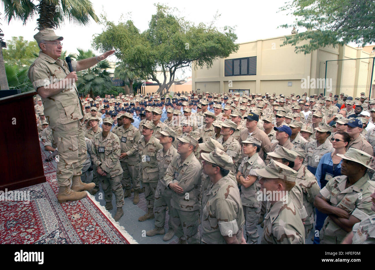 030116-N-2383B-542 Naval Support Activity (NSA), Bahrain (Jan. 16, 2003) -- Admiral Vern Clark, Chief of Naval Operations (CNO), makes remarks during an Òall hands callÓ upon his arrival in Bahrain.  Accompanying the CNO are Rear Adm. Barry Black, Chief of Naval Chaplains, and Master Chief Terry Scott, Master Chief Petty Officer of the Navy (MCPON).  The top three leaders are in the Persian Gulf region visiting with Sailors, Marines, and the joint coalition leadership community.  U.S. Navy photo by Chief Photographer's Mate Johnny Bivera.  (RELEASED) US Navy 030116-N-2383B-542 Admiral Vern Cla Stock Photo