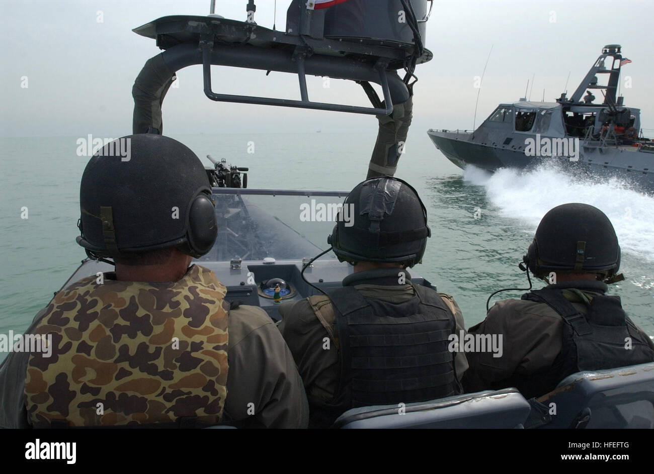 Seals Rhib Naval Special Warfare crewmen operate a RHIB and Mark V Special ...