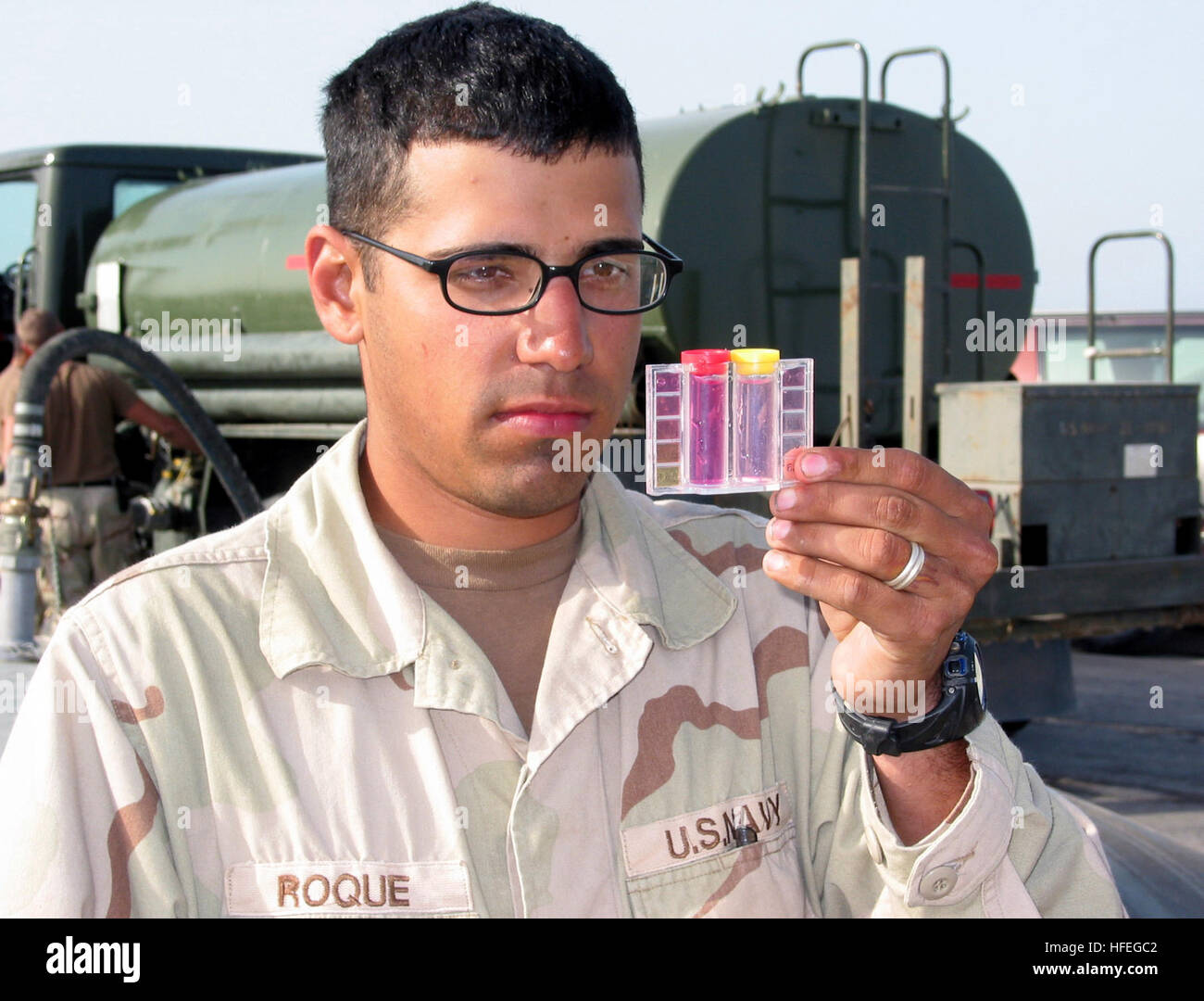 Seabees operate a reverse-osmosis water purification unit (ROWPU) at ...