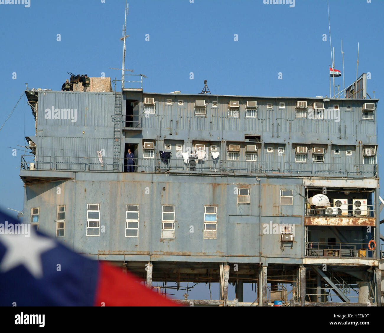 050127-N-0401E-001 Persian Gulf (Jan. 27, 2005) - Iraqi private security officers and Sailors assigned to Mobile Security Force Detachment Two Two (MSD-22), stand watch aboard the Al Basrah Oil Terminal (ABOT). MSD-22 is providing security for IraqÕs oil terminals as part of a joint effort between United States and coalition forces to provide security against terrorist attacks to IraqÕs oil platforms.  U.S. Navy photo by Journalist 1st Class Wes Eplen (RELEASED) US Navy 050127-N-0401E-001 Iraqi private security officers and Sailors assigned to Mobile Security Force Detachment Two Two (MSD-22), Stock Photo