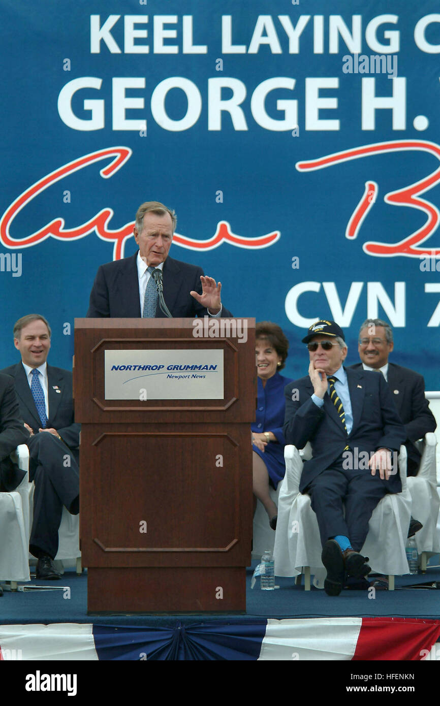 030906-N-2383B-073 Newport News, Va. (Aug. 26, 2003) -- Principle speaker President George H.W. Bush makes remarks during the keel laying ceremony of the aircraft carrier named in his honor, which is 10th and final Nimitz-class carrier that will be built. Named after the nation's 41st president, this 21st century warship will feature numerous engineering and technology improvements, and is slated to be the 10th and final Nimitz-class nuclear powered carrier. U.S. Navy photo by Chief Photographer's Mate Johnny Bivera. (RELEASED) US Navy 030906-N-2383B-031 A member of the Navy parachute team, Stock Photo