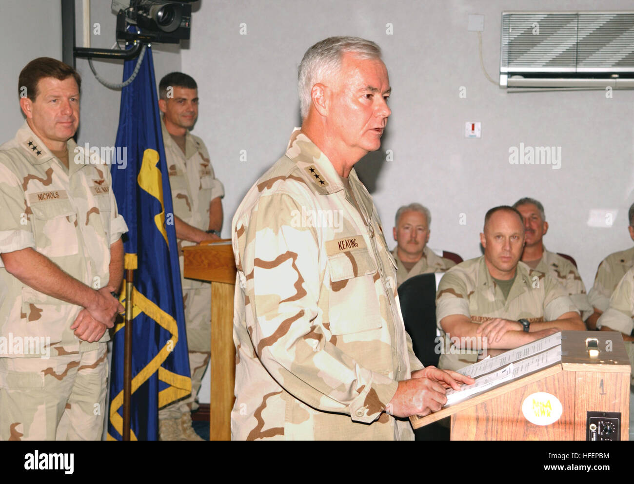 031007-N-7573H-005  Manama, Bahrain (Oct. 7, 2003) - Outgoing Commander U.S. Naval Forces Central Command/ Commander, Fifth Fleet Vice Adm. Timothy J. Keating speaks with guest gathered for a change of command ceremony at Fifth Fleet Headquarters in Bahrain.  Vice Adm. David C. Nichols, Jr. relieved Keating, who led Fifth Fleet Sailors and Marines for the past 20 months during Operations Enduring Freedom and Iraqi Freedom.  U.S. Navy photo by Photographer's Mate 1st Class Ernest Hunt.  (RELEASED) US Navy 031007-N-7573H-005 Outgoing Commander U.S. Naval Forces Central Command- Commander, Fifth  Stock Photo