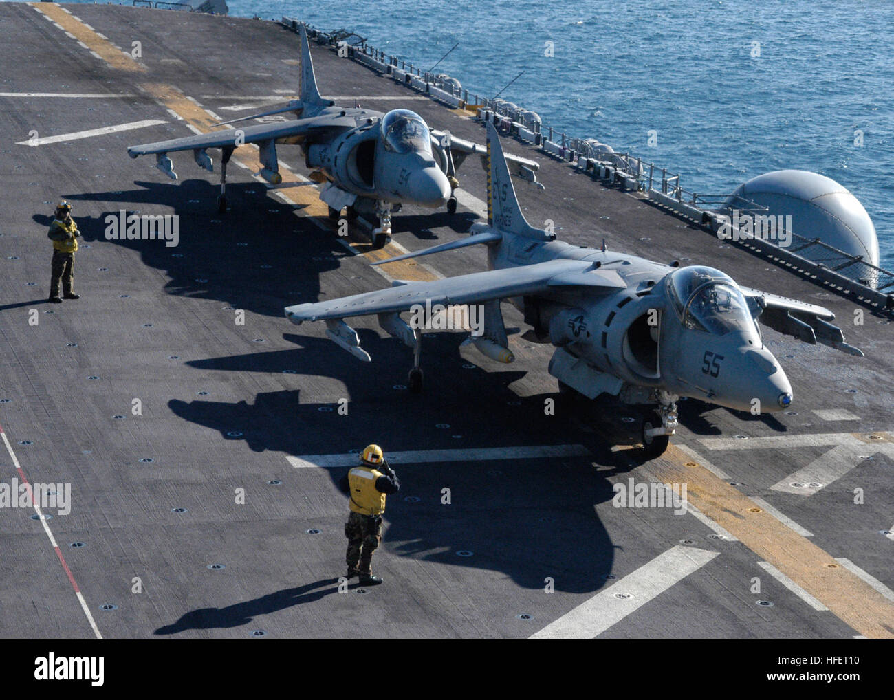 031215-N-8053S-002 Gulf of Mexico (Dec. 15, 2003) – Two AV-8B Harriers prepare to launch from the flight deck aboard the amphibious assault ship USS Wasp (LHD 1).  The Wasp Expeditionary Strike Group's (ESG) is conducting exercises in the Gulf of Mexico in preparation for the first-ever East Coast ESG deployment early next year. U.S. Navy photo by Photographer's Mate 3rd Class David K. Simmons. (RELEASED) US Navy 031215-N-8053S-002 Two AV-8B Harriers prepare to launch from the flight deck aboard the amphibious assault ship USS Wasp (LHD 1) Stock Photo