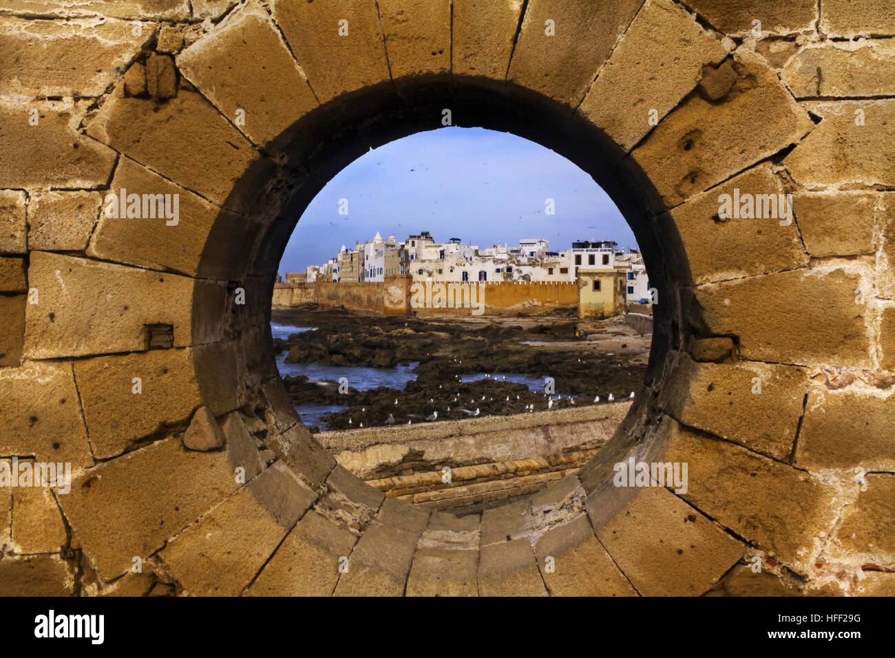 Essaouira, Morocco city walls from the porthole in old Citadel Stock Photo