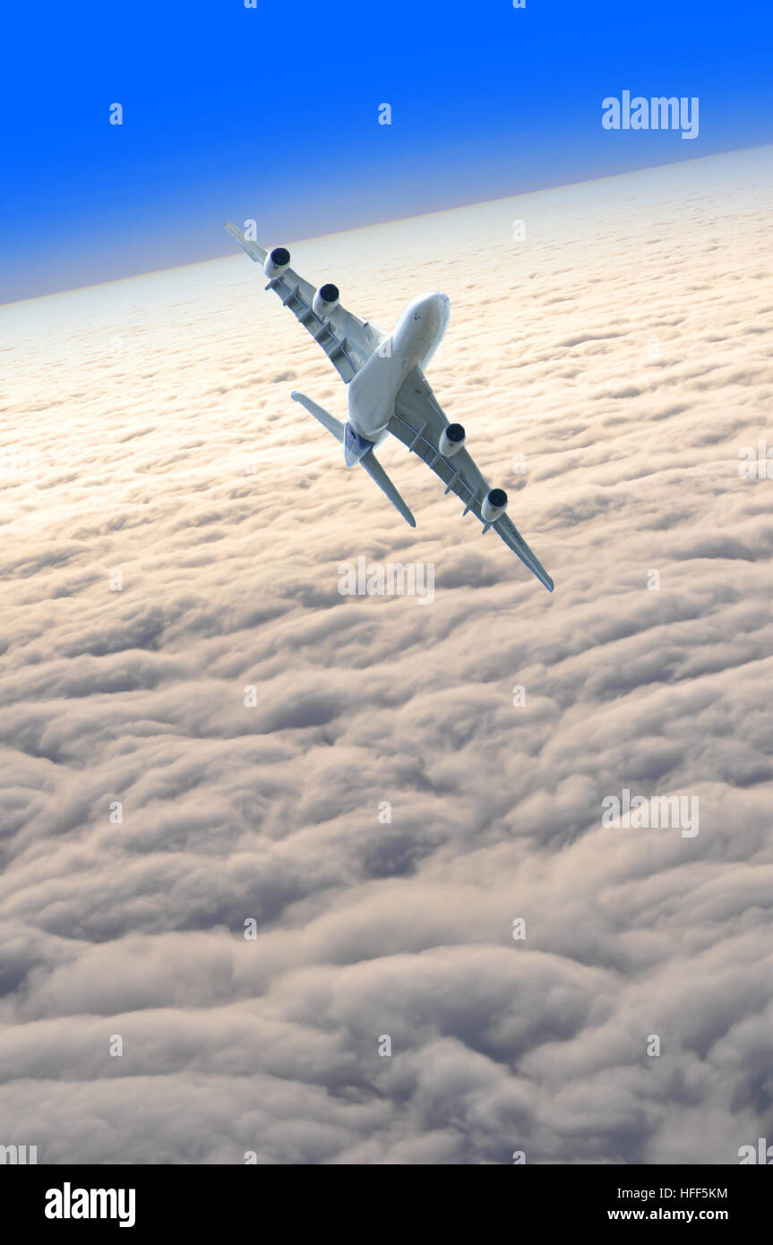 Airplane above the clouds Stock Photo