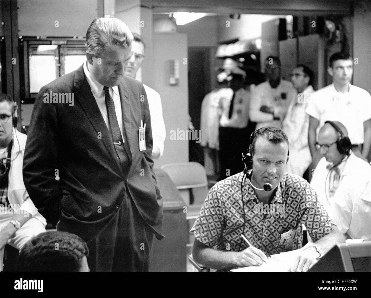 Dr. Wernher von Braun, a leading figure in rocket technology, stands ...