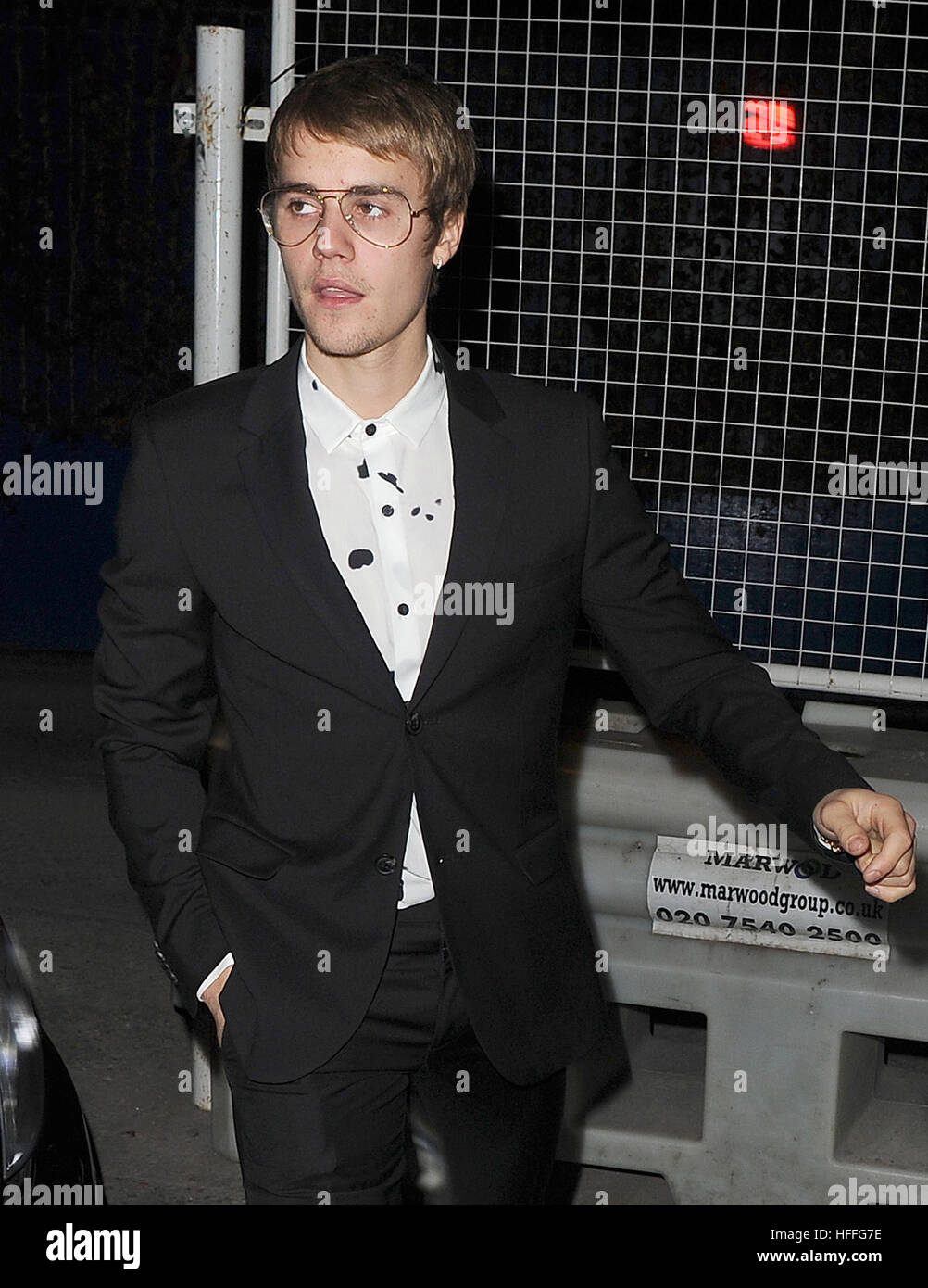 shirt inside black suit
