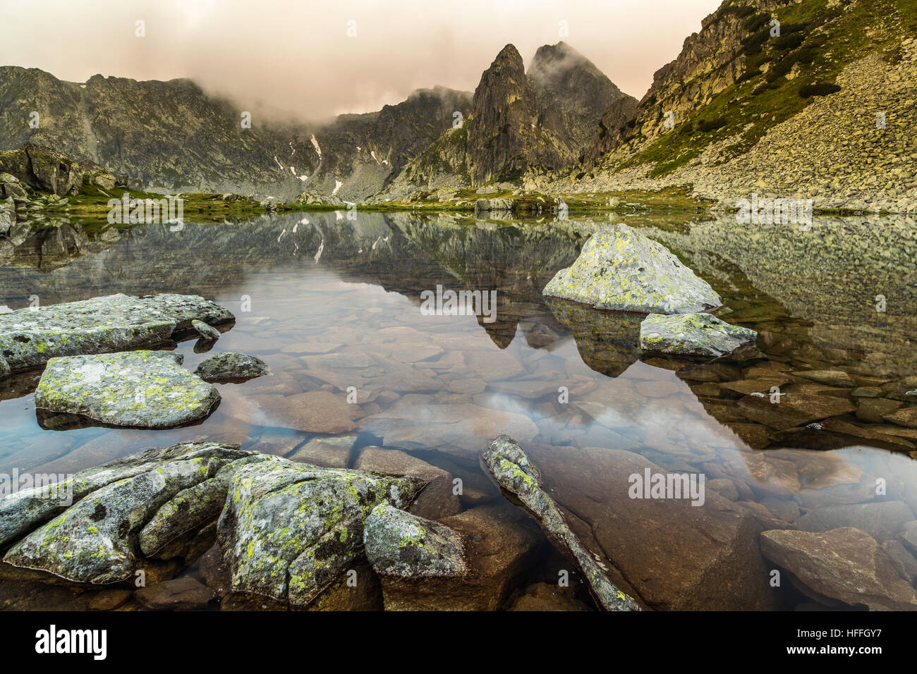 Mountains reflection on the lake, Retezat Mountains Stock Photo - Alamy