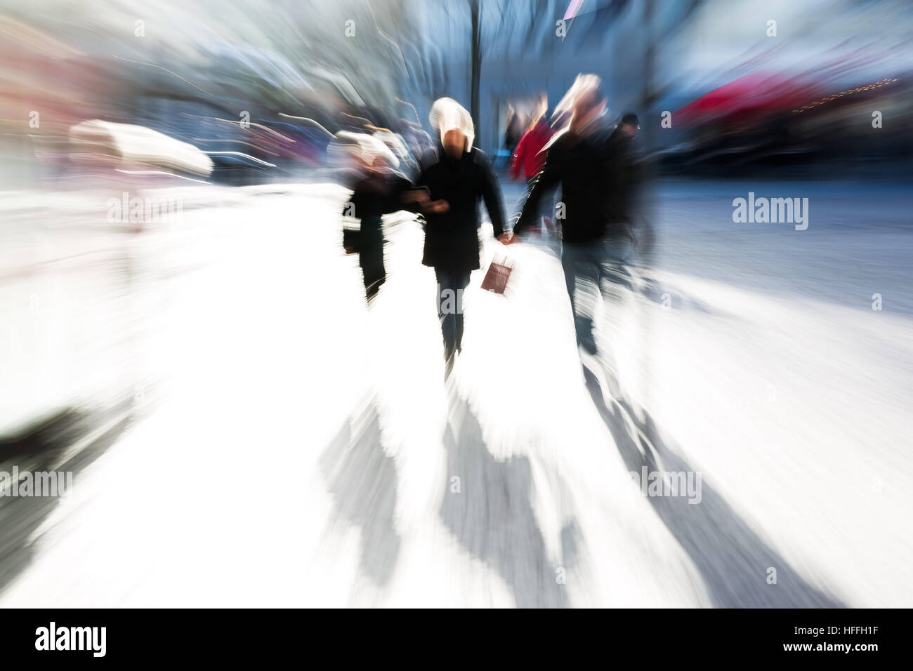 people walking on a shopping street with camera made zoom effect Stock ...