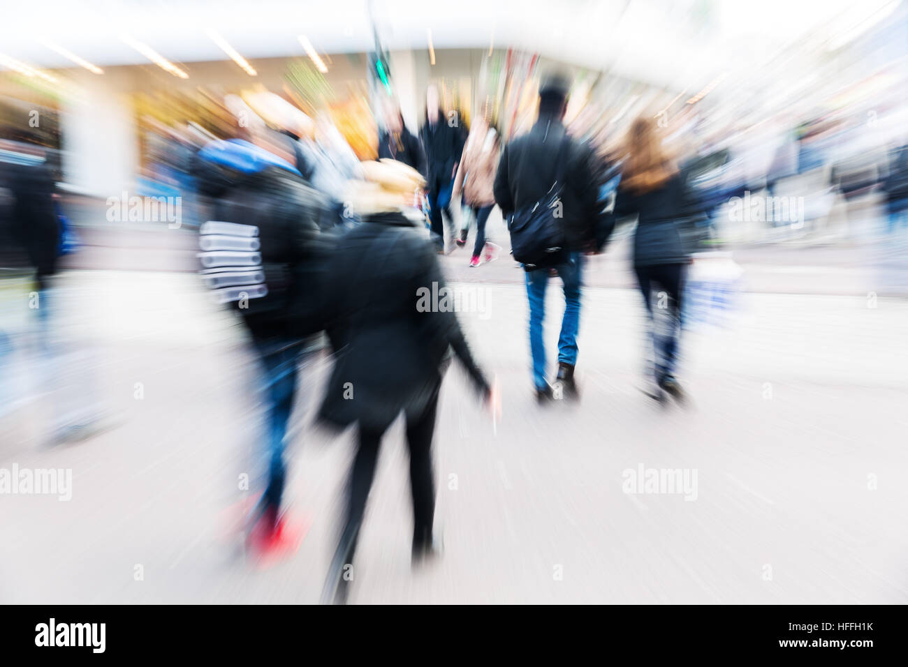 people walking on a shopping street with camera made zoom effect Stock ...