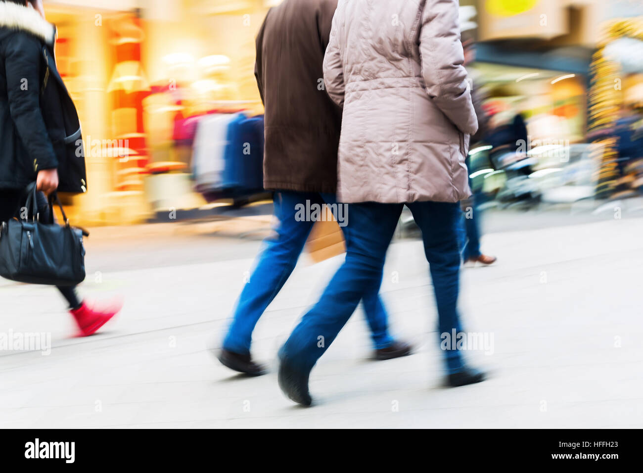 people walking on a shopping street with camera made motion blur Stock ...
