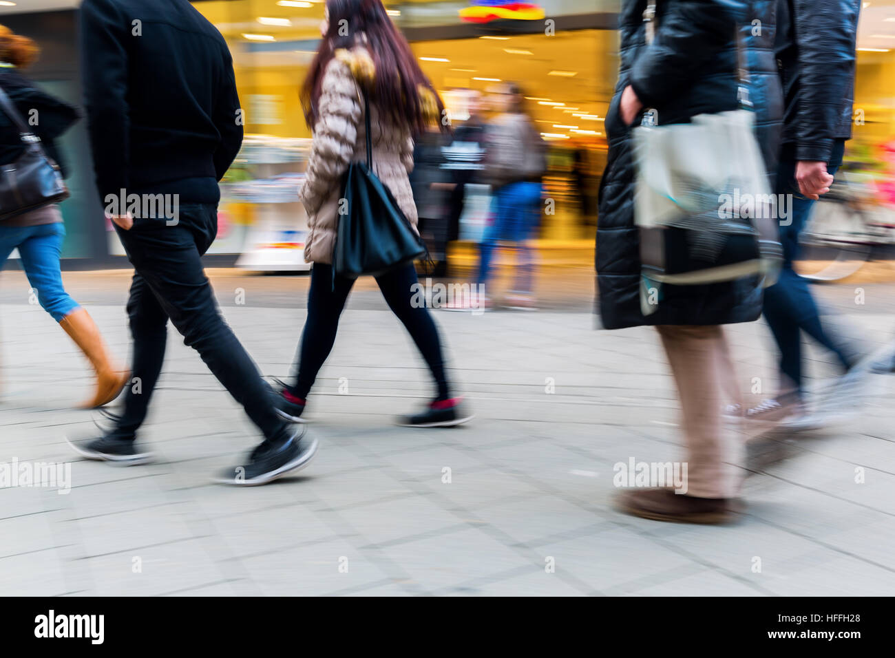 people walking on a shopping street with camera made motion blur Stock ...