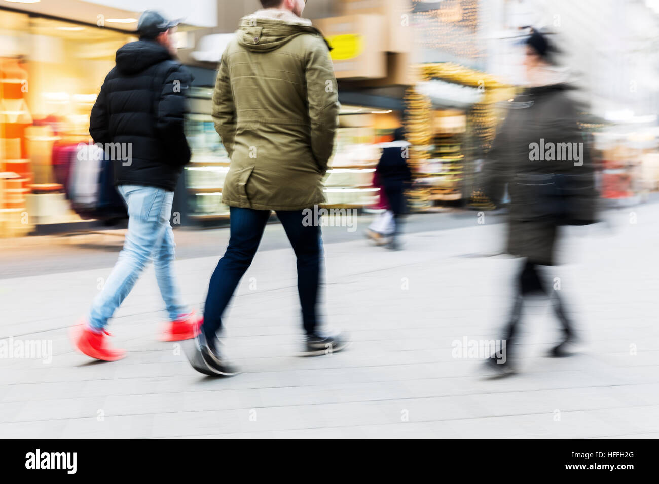 people walking on a shopping street with camera made motion blur Stock ...