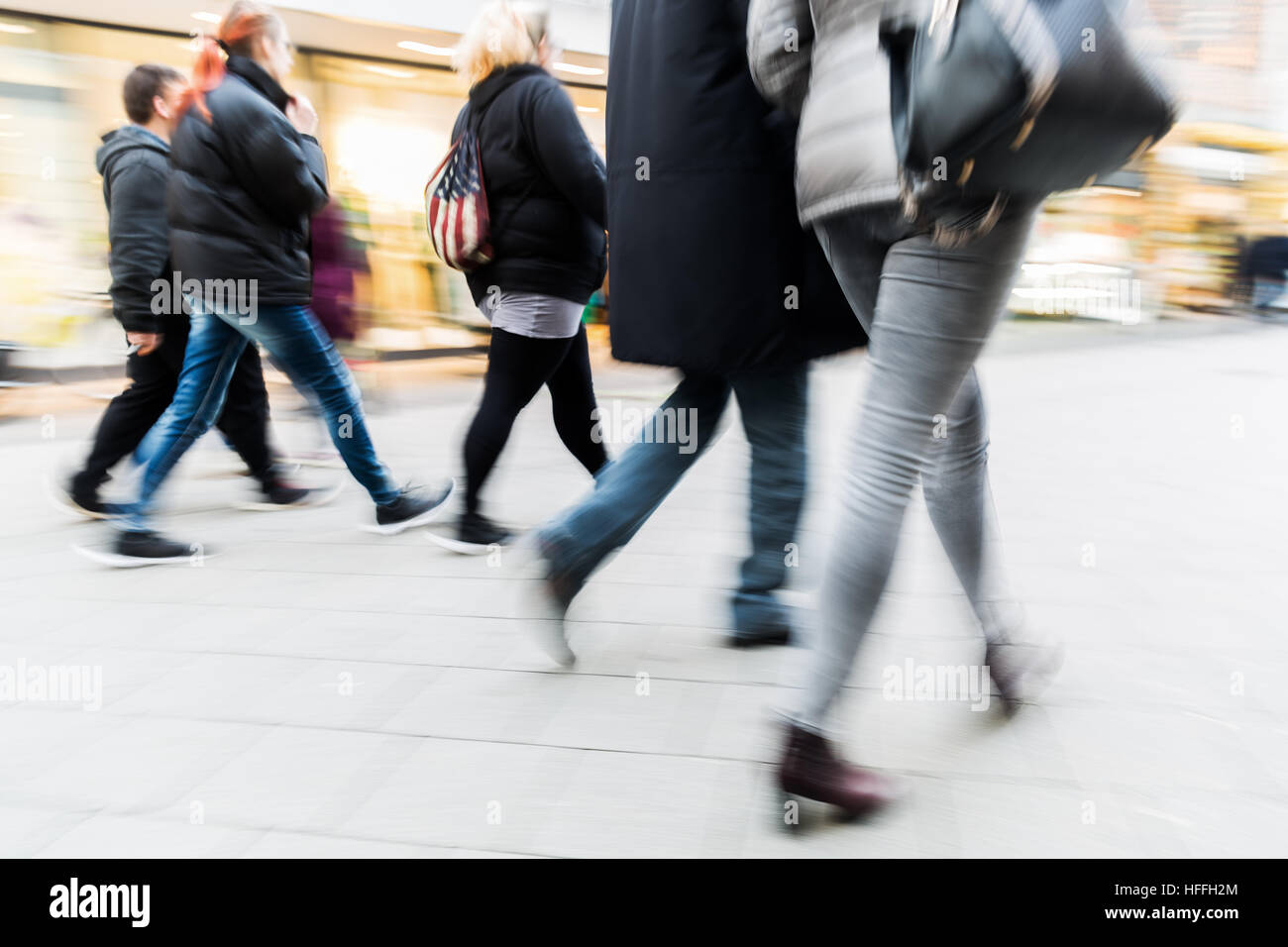 people walking on a shopping street with camera made motion blur Stock ...