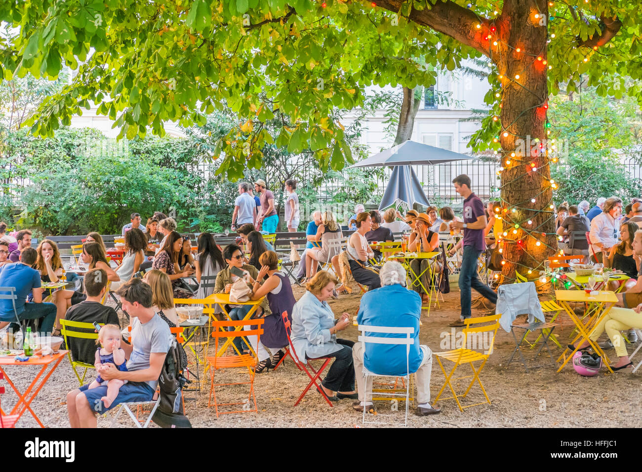 open air cafe during summer, inner courtyard of institut catholique de paris Stock Photo