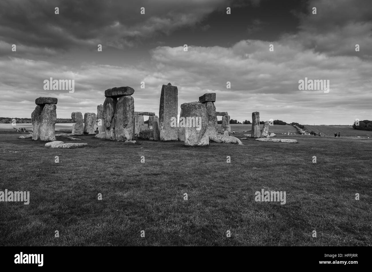 Stonehenge under a dramatic sky in black and white, Salisbury, England Stock Photo