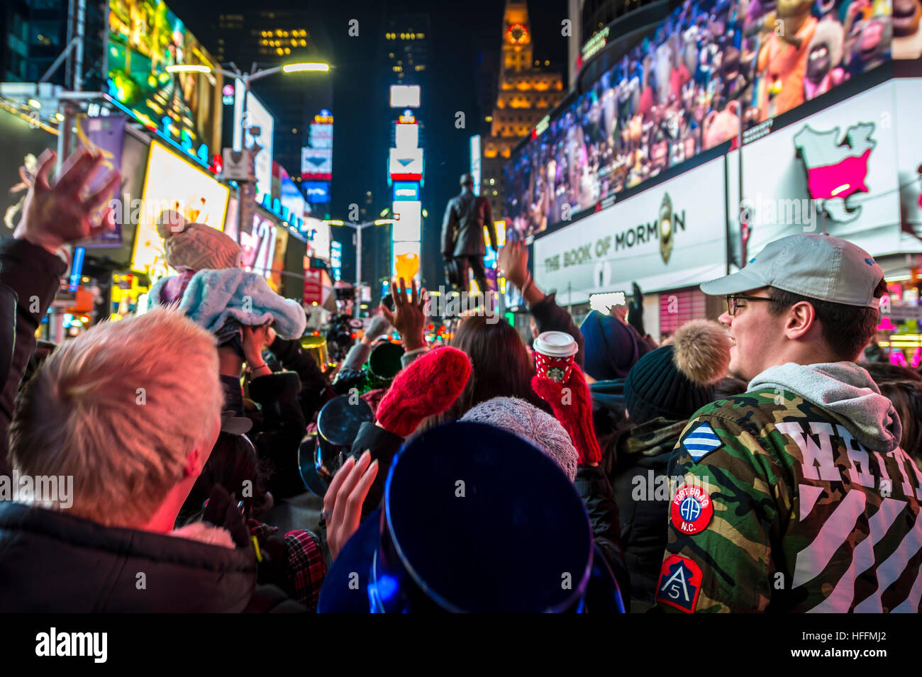 NEW YORK CITY - DECEMBER 23, 2016: Traffic and crowd fill Times Square as the city prepares for New Year's Eve. Stock Photo