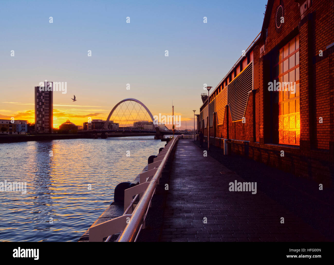 UK, Scotland, Lowlands, Glasgow, View over the River Clyde towards the Clyde Arc at sunset. Stock Photo