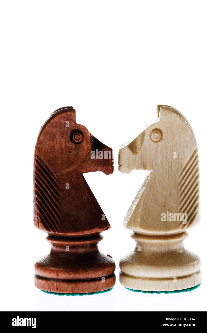 Chess pieces: brown and white knights Stock Photo